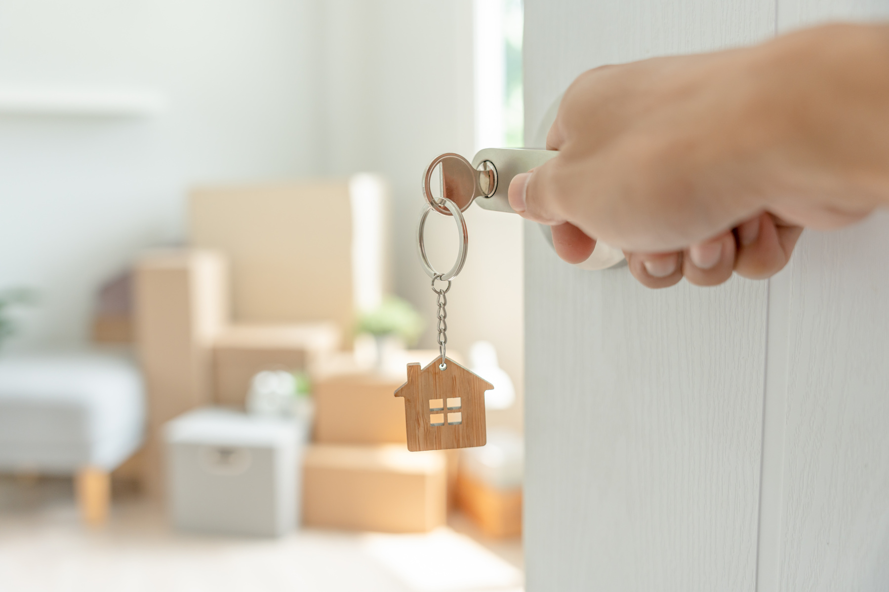 Moving house, relocation. The key was inserted into the door.
