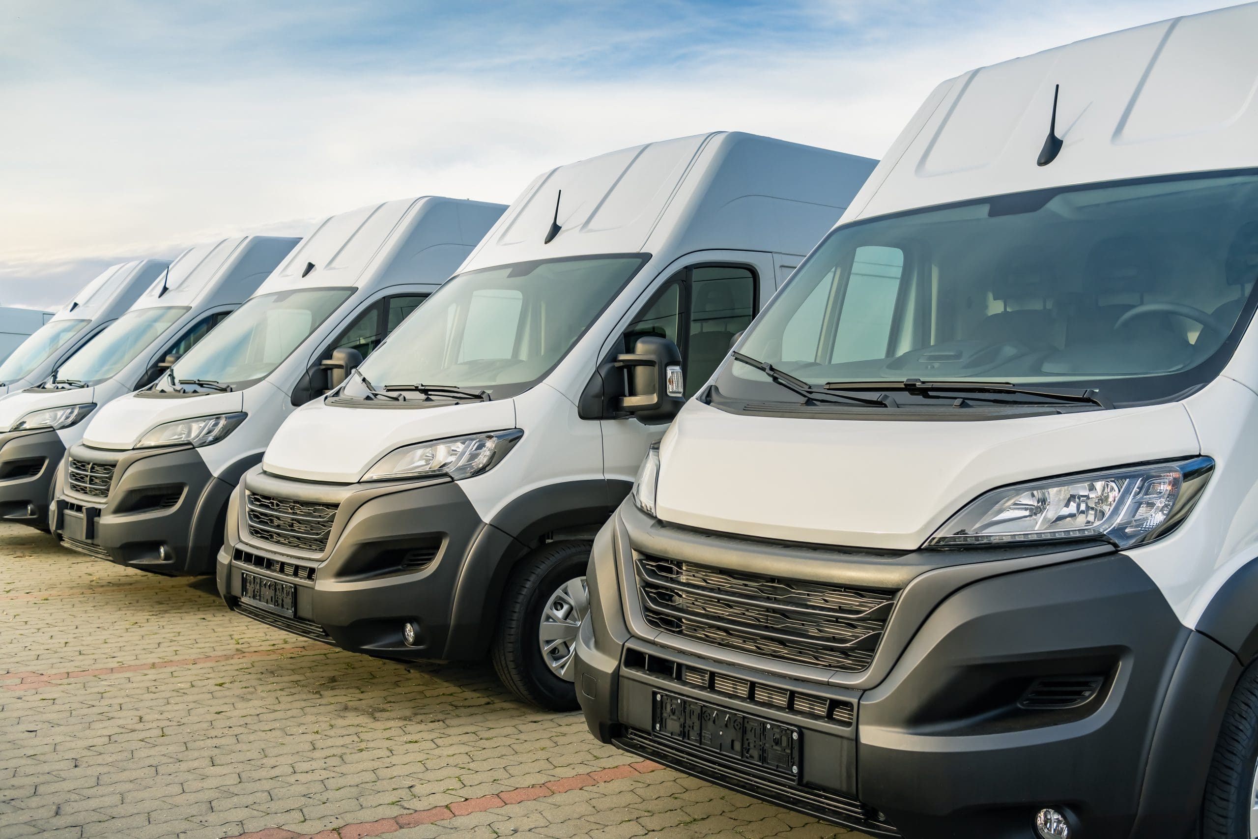 Commercial delivery vans parking in a row.